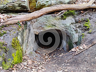 Cave entrance seen from the outside Stock Photo