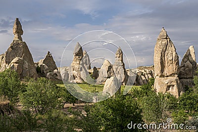 Cave house of Fairy Chimneys rocks mushroom in Pasabag, Monks Valley, Cappadocia, Turkey. Stock Photo