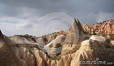 Cave houses and fairy chimneys rock near Goreme village Stock Photo