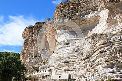 Cave houses near Alcala del Jucar, Spain Stock Photo