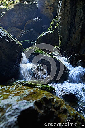 Cave river and waterfall Stock Photo