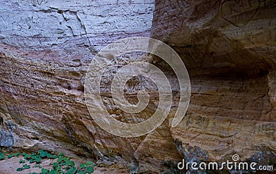 Cave wall with carvings Stock Photo