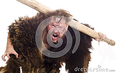 Caveman in bear skin Stock Photo