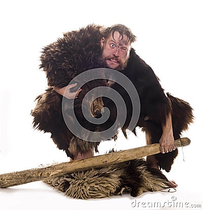 Caveman in bear skin Stock Photo
