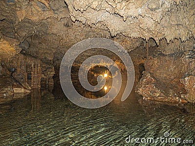 Caves of Diros or The Alepotrypa Cave is an archaeological site in the Mani region of the Peloponnese peninsula, Greece. Stock Photo