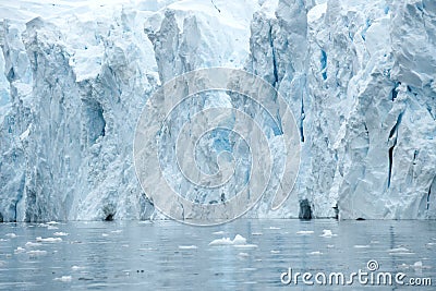 Shelf ice in Antarctica. Glacier wall with caves, Paradise Bay, Antarctica Stock Photo