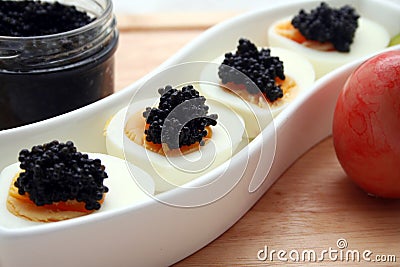 Caviar on eggs Stock Photo