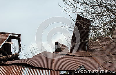 Caving in barn roof Stock Photo