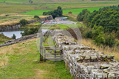 Cawfields.Where Hadrian`s Wall hangs on the edge of the sheer crags of the Whin Sill Editorial Stock Photo