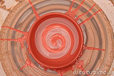 Cay pot painted on a potter wheel, modeling of pot hands, the sculpting of the hands. Stock Photo