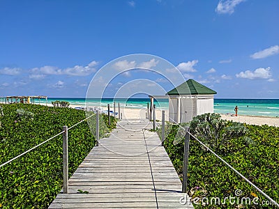 Cayo Coco, Cuba, May 16, 2021: Nice view from the wooden bridge to the cuban beach Editorial Stock Photo