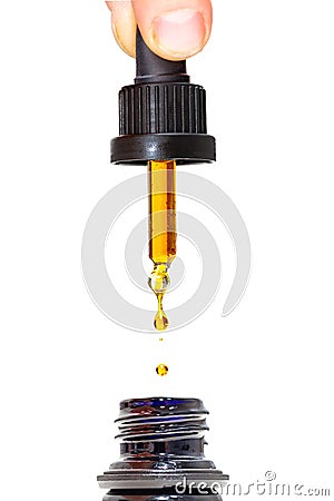 CBD Oil Dropper Stock Photo