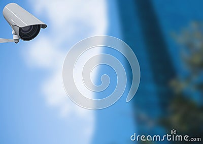 CCTV camera against defocused building Stock Photo