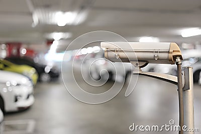 CCTV camera digital video recorder in car park. Stock Photo