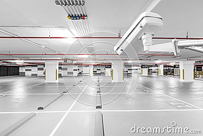 CCTV camera in underground parking garage Stock Photo