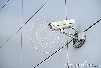 CCTV outdoor camera on a wall Stock Photo