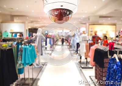 CCTV Security camera shopping department store on background. Stock Photo