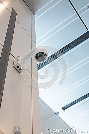 CCTV Security camera wall ceiling Stock Photo