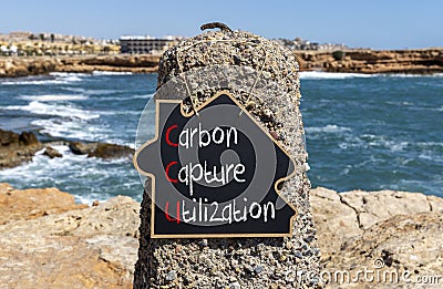 CCU Carbon capture utilization symbol. Concept words CCU Carbon capture utilization on beautiful blackboard Beautiful stone Stock Photo