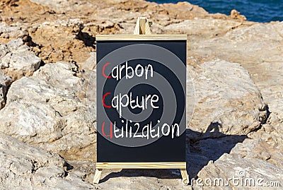 CCU Carbon capture utilization symbol. Concept words CCU Carbon capture utilization on beautiful blackboard Beautiful stone Stock Photo