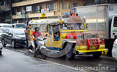 Traditional Jeepney on street city Editorial Stock Photo
