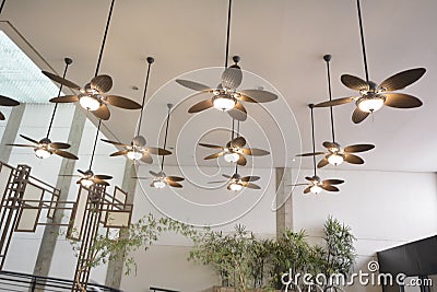Ceiling fans, colonial style with lights on in a luxury resort in the background decorations a Stock Photo
