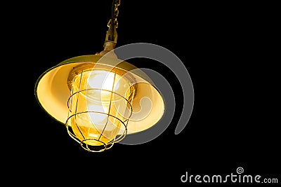 Ceiling hanging light lamp isolated on black background Stock Photo