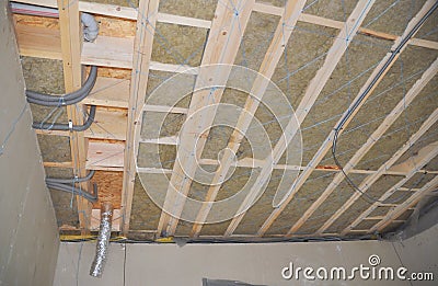 Ceiling Insulation saves energy and money. Attic Insulation. House Ceiling Insulation Stock Photo