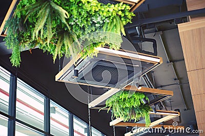 Ceiling mounted cassette type air conditioner for large rooms, exhibition room, Modern cafe Editorial Stock Photo