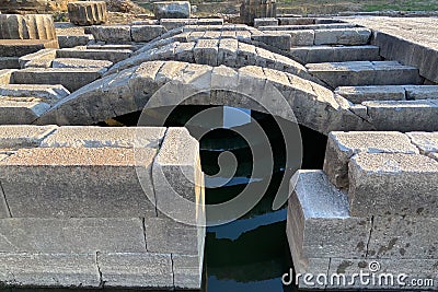 Ceiling ruins of ancient stone temple of Apollon in Klaros ancient city filled water Stock Photo