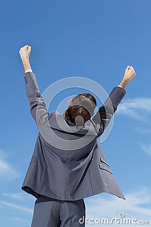 Celebrate, business man and fist in air with happiness and success feeling excited from promotion. Outdoor, businessman Stock Photo