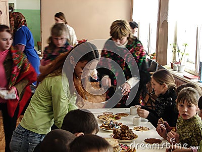 Celebrate Russian folk holiday Maslenitsa in a village school in Kaluga region. Editorial Stock Photo