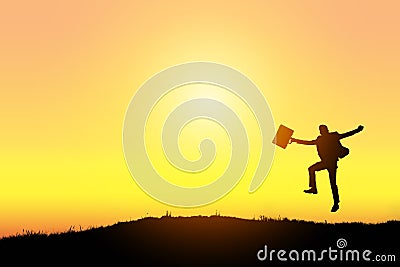 Celebrating success. Silhouette of happy excited businessman jumping on the ground Stock Photo