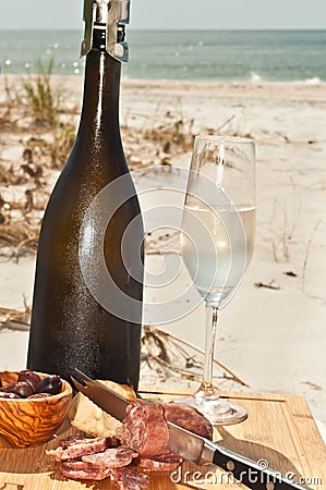 Celebration of autumn with a chilled glass and a vintage bottle of champagne Stock Photo