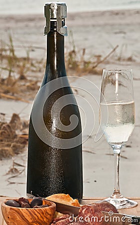 Celebration of autumn with a chilled glass and a vintage bottle of champagne Stock Photo