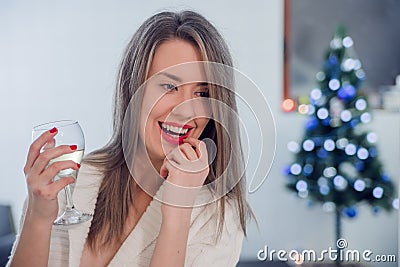 celebration, drinks, friends, bachelorette party, birthday concept. Toothy smiling woman with red lips holding vine glass Stock Photo