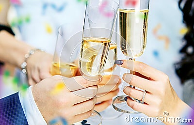 Celebration. Hands holding the glasses of champagne and wine making a toast. Stock Photo