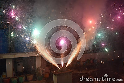 Celebration with illustration of exploding Firecracker A view of a type of firework, cracker named peacock cracker, during the Cartoon Illustration
