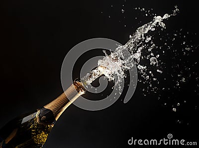 Celebration theme with splashing champagne Stock Photo