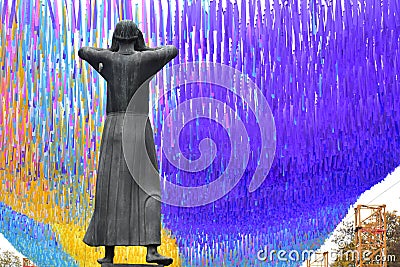 Celebration of 30 year anniversary of the fall of the Berlin Wall with der Rufer statue Germany Editorial Stock Photo