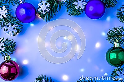 Celebratory background with Christmas decorations and multicolored backligt. Space for text. Stock Photo