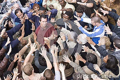 Celebrity Amidst With Fans Around Him Stock Photo