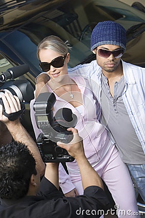 Celebrity Couple And Paparazzi Stock Photo