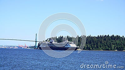 Celebrity Millennium Cruise Ship past the famous Stanley Park in Vancouver for a seven-day Alaska cruise vacation. Editorial Stock Photo