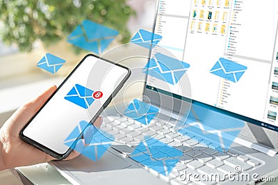 Cell phone and laptop with lots of message icons. Concept of sending message wireless using smartphone. Communication Digital Web Editorial Stock Photo