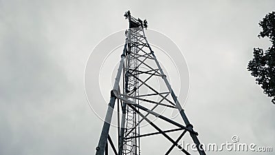 A cell phone mobile phone tower photo taken from below the tower Stock Photo