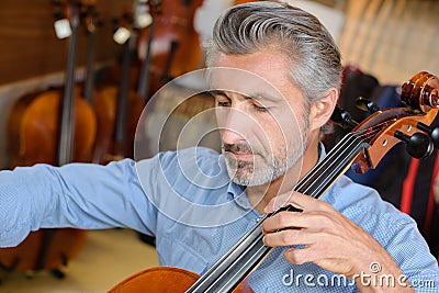 Cellist playing the cello Stock Photo