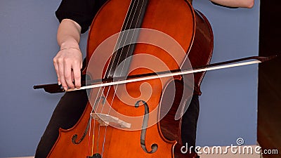 Cellist playing cello Stock Photo