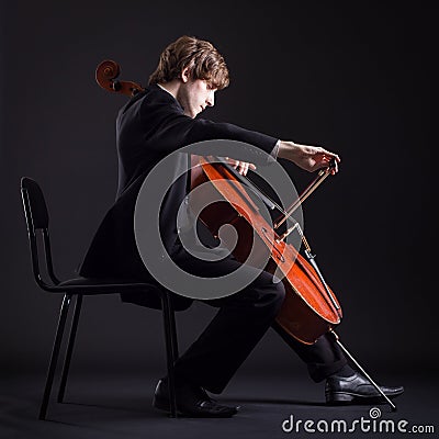 Cellist playing on cello Stock Photo