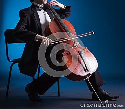 Cellist playing on cello Stock Photo